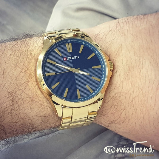 Relógio curren steel em aço dourado azul