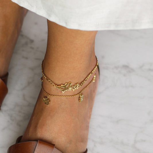 Pulseira de pé com pendentes flor de lótus em aço dourado