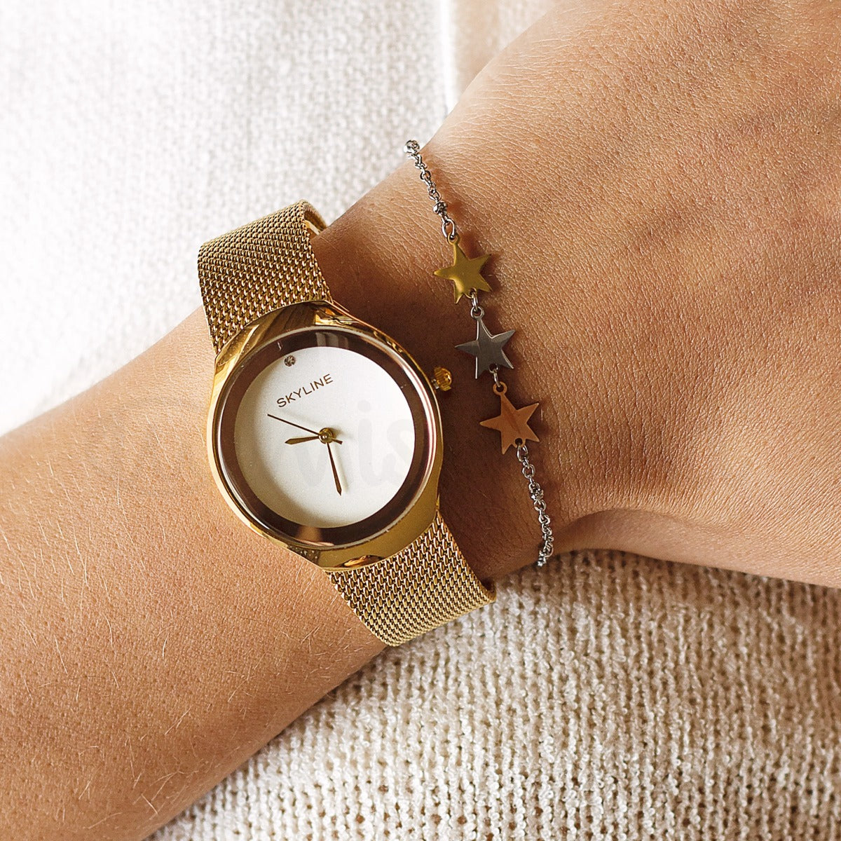 Relógio Skyline Katrina em aço dourado com fundo branco