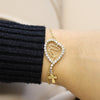 Pulseira Nossa Senhora c/Cruz com Brilhantes em Aço