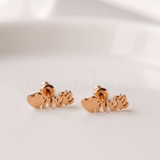 Brincos mãe Coraçon em aço dourado