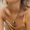 Colar Acrus em aço dourado 